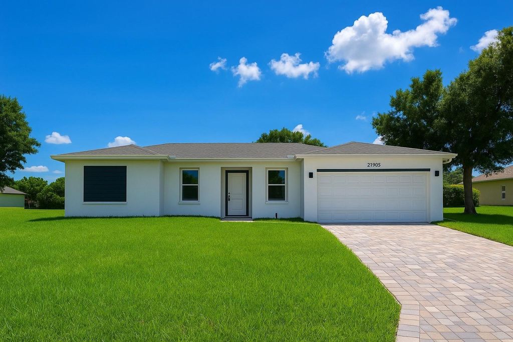 Photo of 21295 Wynyard Avenue, Port Charlotte, FL 33954 (MLS # O6380669)
