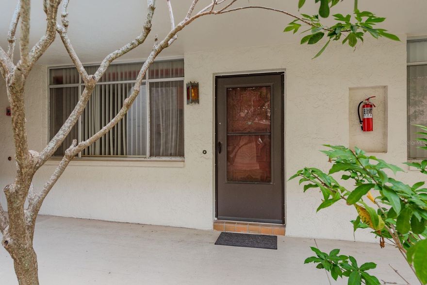 GREAT LOCATION - GREAT OPPORTUNITY - Bring your imagination and your tools. This one bedroom 1 1/2 bath FIRST FLOOR condo has great potential. Situated in the beautiful park like setting of Seville where you can enjoy all the great community amenities including; community pool, clubhouse, billiards room, card room, horse shoe pits and community garden. It's close to a great variety of shopping and dining as well as world famous beaches, US Hwy 19N and Gulf to Bay. The bedroom is HUGE with a cedar-lined walk-in closet and ensuite bathroom. There's a Dining Room and a spacious Living Room with sliders that open to a private patio/courtyard. There are several closets for storage. It's a perfect week-end getaway retreat, seasonal or year-round home. Don't miss this opportunity to make it your own.