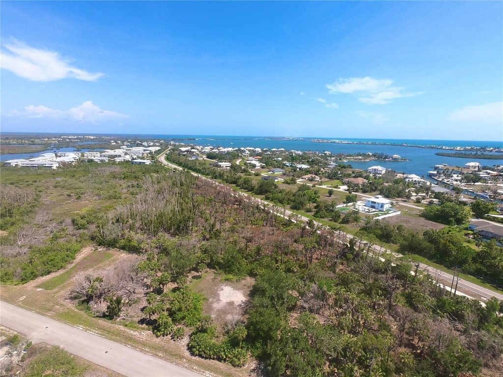 Photo of 10131 Creekside Drive, Placida, FL 33946 (MLS # C7510444)