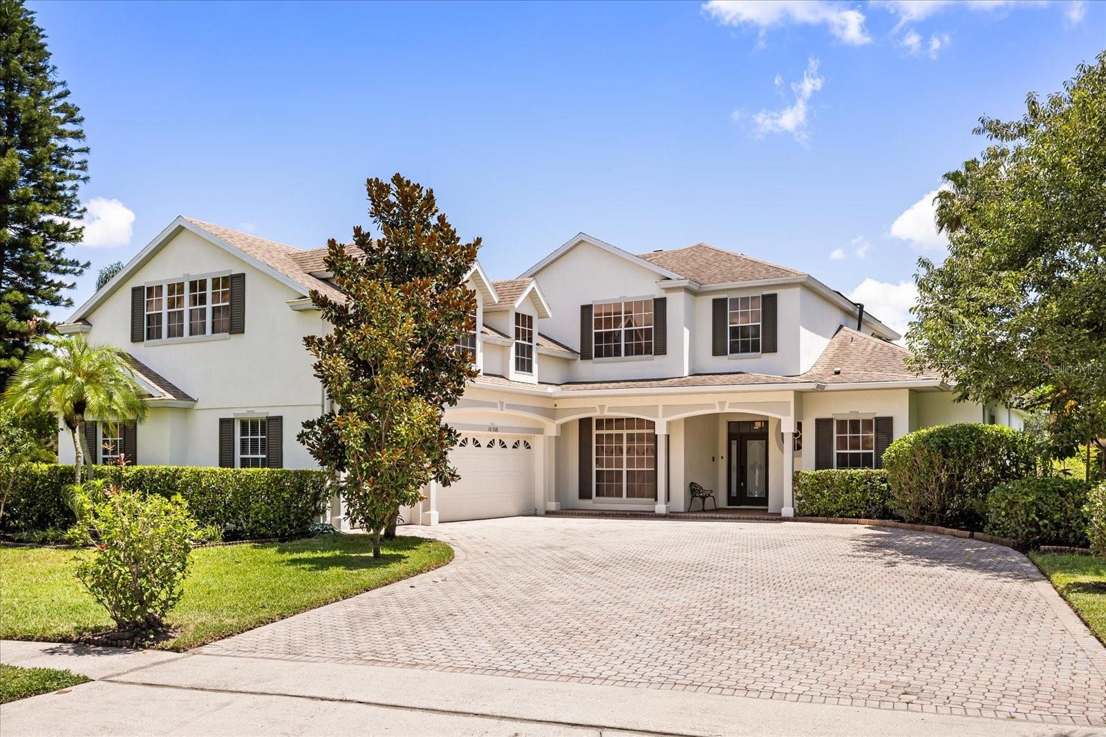 Welcome to this Meticulously maintained spacious pool home, located in the desirable community of Emerald Forest. This stunning single-family home offers 6 bedrooms & 5 Full bathrooms nearly 5000 square feet of elegant living space, perfect for multigenerational living or large families. Nested on a large .30-acre lot, the home impresses from the start with a wide paver driveway, 3- car-garage, and a striking front yard with majestic palm trees. Inside, enjoy multiple living and dining spaces, separate formals, large family room & kitchen with breakfast nook. High ceilings and abundant natural light enhance the open layout. A Standout feature is the mezzanine-level bedroom suite- a massive, private retreat complete with its own full bathroom and walk-in closet, ideal for guests, extended family, or a luxurious home office. Upstairs, you'll find an enormous second family room, four generously sized bedrooms, 2 full bathrooms & access to an outdoor balcony. This exceptional home blends comfort, space and luxury- ideal for large families or those who love to entertain.
Excellent location offers quick access to Restaurant Row, upscale shopping, O-Town West, major highways, theme parks, airports and downtown.