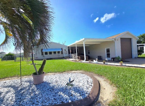Photo of 4882 SE 130th Place, Belleview, FL 34420 (MLS # OM734330)