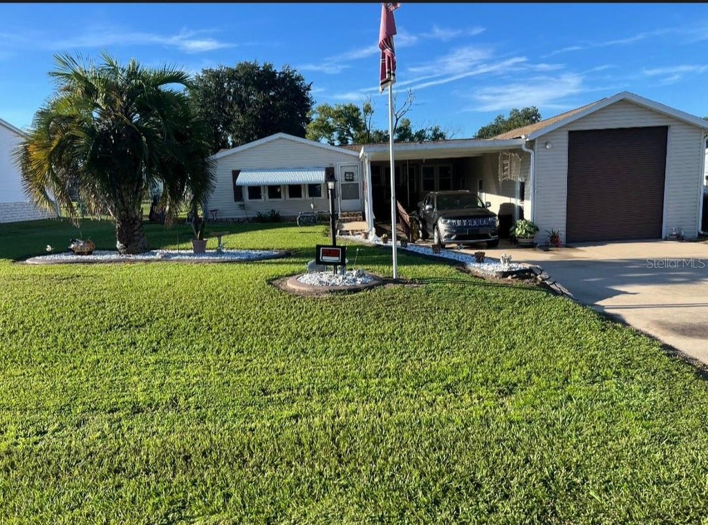 Photo of 4882 SE 130th Place, Belleview, FL 34420 (MLS # OM734330)