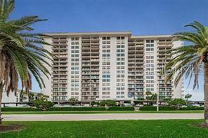 2-bedroom, 2-bath condo on Island Estates, just minutes away from the renowned Clearwater Beach! This spacious residence features a large, updated kitchen with abundant storage and ample countertop space, perfect for culinary enthusiasts. The expansive dining and family room boasts sliding doors that lead to your own private balcony, inviting in natural light. The community amenities are impressive, offering a heated pool with a relaxing spa, a fitness center, and a recreation facility equipped with a kitchen, pool table, sauna, library, and card tables. Enjoy the convenience of a covered parking spot and an open floor plan that enhances the living space. For added convenience, this unit includes an in-home washer and dryer, complemented by a sizable laundry area within the building. With Publix only steps away and a variety of restaurants, shopping options, Clearwater Aquarium, and much more nearby, you'll love the vibrant lifestyle this location provides.