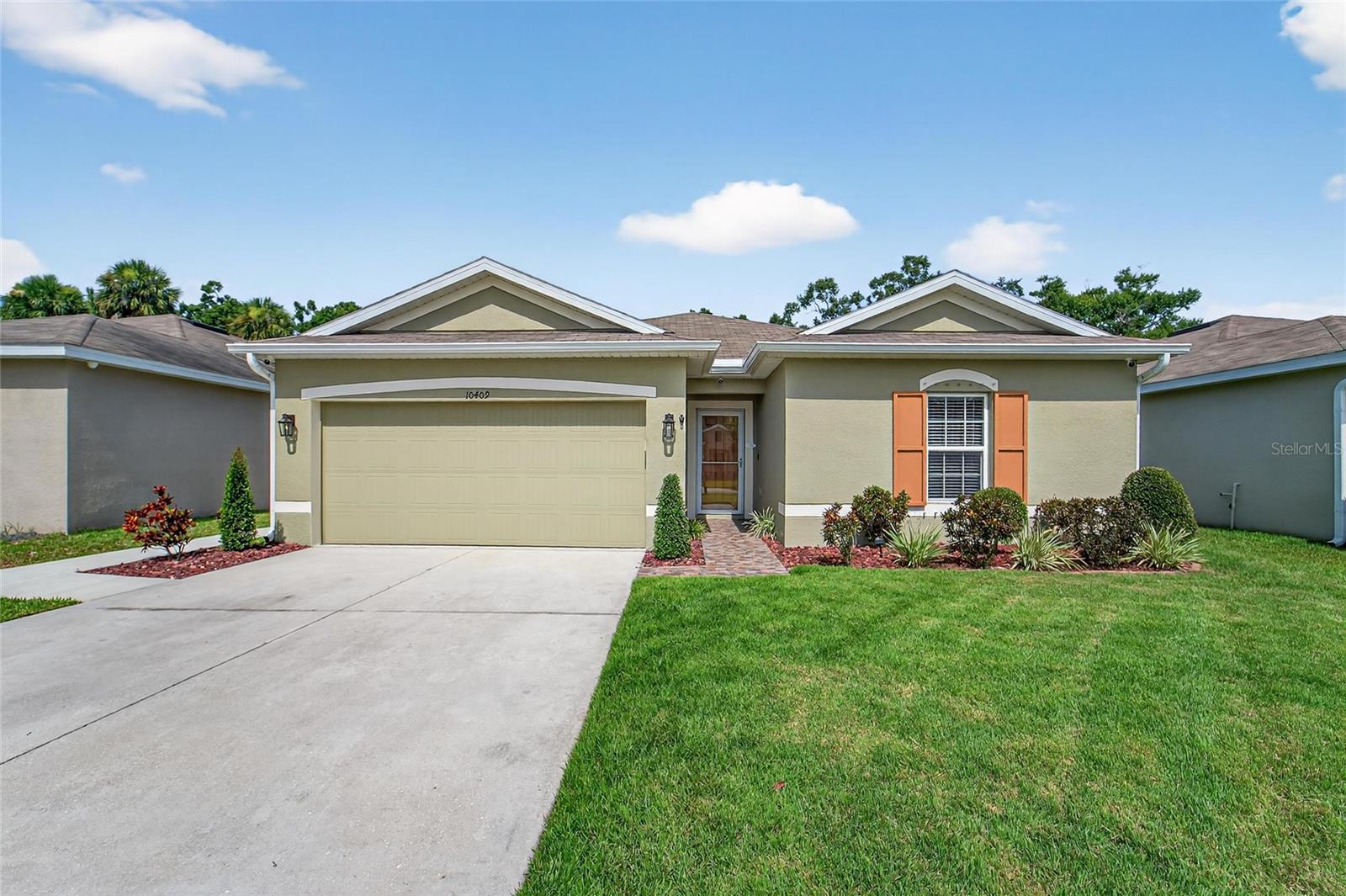 Affordability, condition and location! Situated perfectly for commuting on I-75/US 301/41 corridor, this 2019 built one owner home has been meticulously maintained. Truly move-in ready and upgrades in place you won't find often. The entrance walkway is tiled and features glass storm door already in place to allow extra light into the home. Note the additional sidewalk from front of home to rear yard gate area - for ease of landscaping. Bedrooms #2 and #3 are at the front of the home and share bath#1 with tub/shower combination. Kitchen and baths feature ceramic tile, great room has been updated with wood look plank ceramic tile as well. Bedrooms are carpeted. Great room is nice size, open to kitchen with easy access to rear lanai/yard for entertaining. Kitchen features closet pantry, center island with seating, solid wood cabinets, updated lighting fixtures, tile backsplash and additional seating in dinette area. Primary bedroom is nice size, with en-suite bathroom featuring walk-in shower with upgraded shower door and walk-in closet with barn door feature. The backyard is an OASIS starting with the extended screened lanai with tile floor and roll down sun shades already in place. Good size shed and gazebo create a great space for entertaining, grilling or play. Yes, there's more: hurricane shutters for home, exterior paint (2024), 50 Amp GENERATOR OUTLET on side of home, irrigation front and back, NO mulch to replace in landscape beds - rock has already been done, keyless garage entry, WI-FI capable garage door opener and ring doorbell. NO CDD in this community! Shopping, dining and entertainment is conveniently located just 5 minutes away! This is a must see, make your appointment quickly before it's gone!