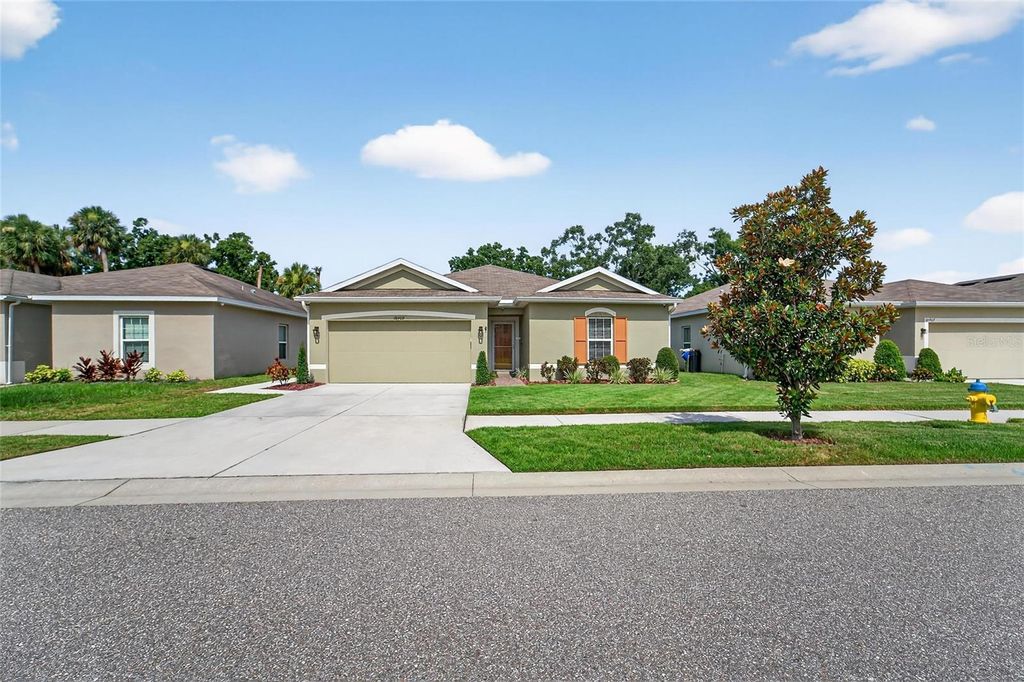 Photo of 10409 Candleberry Woods Lane, Gibsonton, FL 33534 (MLS # TB8404716)