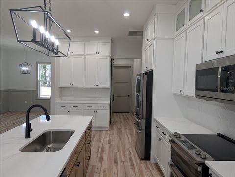 Tiny photo for 1303 NE 23rd Avenue, Ocala, FL 34470 (MLS # OM720139)