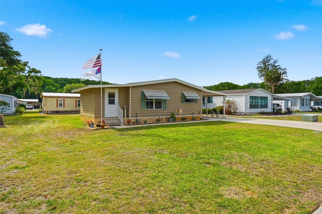 Photo of 111 Winterberry Avenue, Wildwood, FL 34785 (MLS # G5111462)