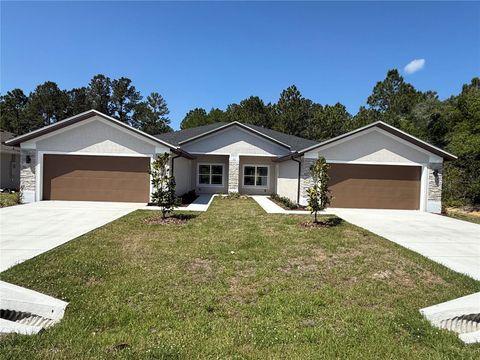Photo of 35 Freneau Lane, Palm Coast, FL 32137 (MLS # FC317019)
