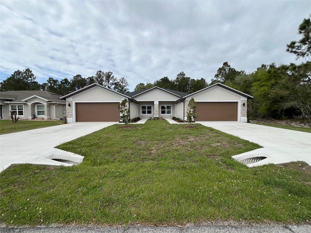 Photo of 35 Freneau Lane, Palm Coast, FL 32137 (MLS # FC317019)