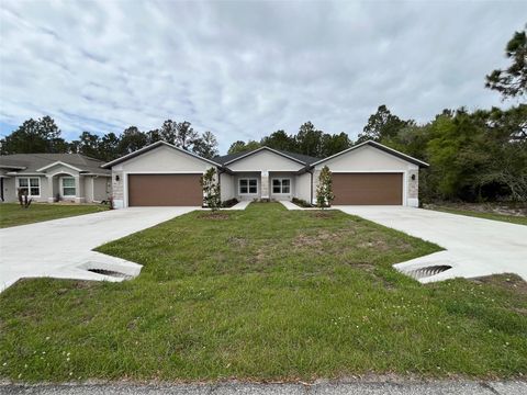 Photo of 35 Freneau Lane, Palm Coast, FL 32137 (MLS # FC317019)