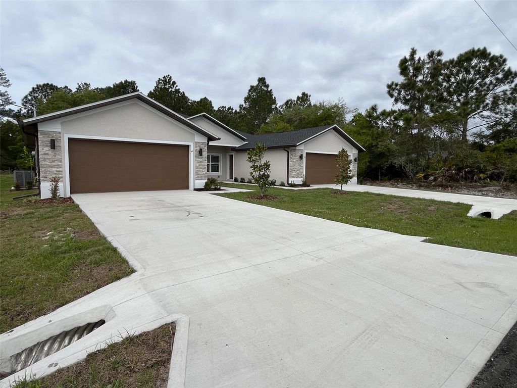 Photo of 35 Freneau Lane, Palm Coast, FL 32137 (MLS # FC317019)