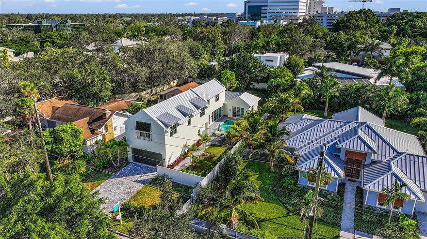 **Seller Financing Options Available** Introducing an exquisite new construction home nestled in the heart of Sarasota. Built by M&J Pham Development, this stunning residence offers an unparalleled combination of luxurious comfort and unbeatable location. As you enter this dazzling property, you will be greeted by an open floor plan that features high ceilings, natural light, and high quality finishes throughout. The home features a modern and elegant kitchen with top-of-the-line Viking appliances, quartz countertops, and custom cabinetry. A large patio with an outdoor kitchen seamlessly blends indoor and outdoor living with meticulously planned landscaping and pool area. The master bedroom of this gorgeous home is a true sanctuary, offering a plush and peaceful retreat after a long day. It boasts an ample layout with plenty of room, and large windows to let in unrestricted natural light, providing a bright and airy feel that's perfect for relaxation. The room also features a generously sized walk-in closet with abundant space for storage and organization as well as a sliding door for you to easily enjoy the outdoor scenery. The master bathroom is equally impressive, featuring a soaking tub and a separate shower that's great for unwinding after a long day. The opulent finishes and high-end materials used throughout the space add to the feel of this spectacular master suite, making it the best place to recharge and rejuvenate. As you ascend the grand staircase to the upper level of the lavish estate, you are met with a breathtaking sight of three cozy bedrooms. Each of the three bedrooms are spacious, and private, with access to a bathroom. This setup is perfect for families or groups of friends looking to stay together in comfort and convenience. Situated between Siesta Key and Downtown Sarasota, you will have easy access to some of the best beaches, restaurants, and shopping that Sarasota has to offer. Whether you are looking for a day at the beach, a night out on the town, or a quiet evening at home, this home has everything you need.