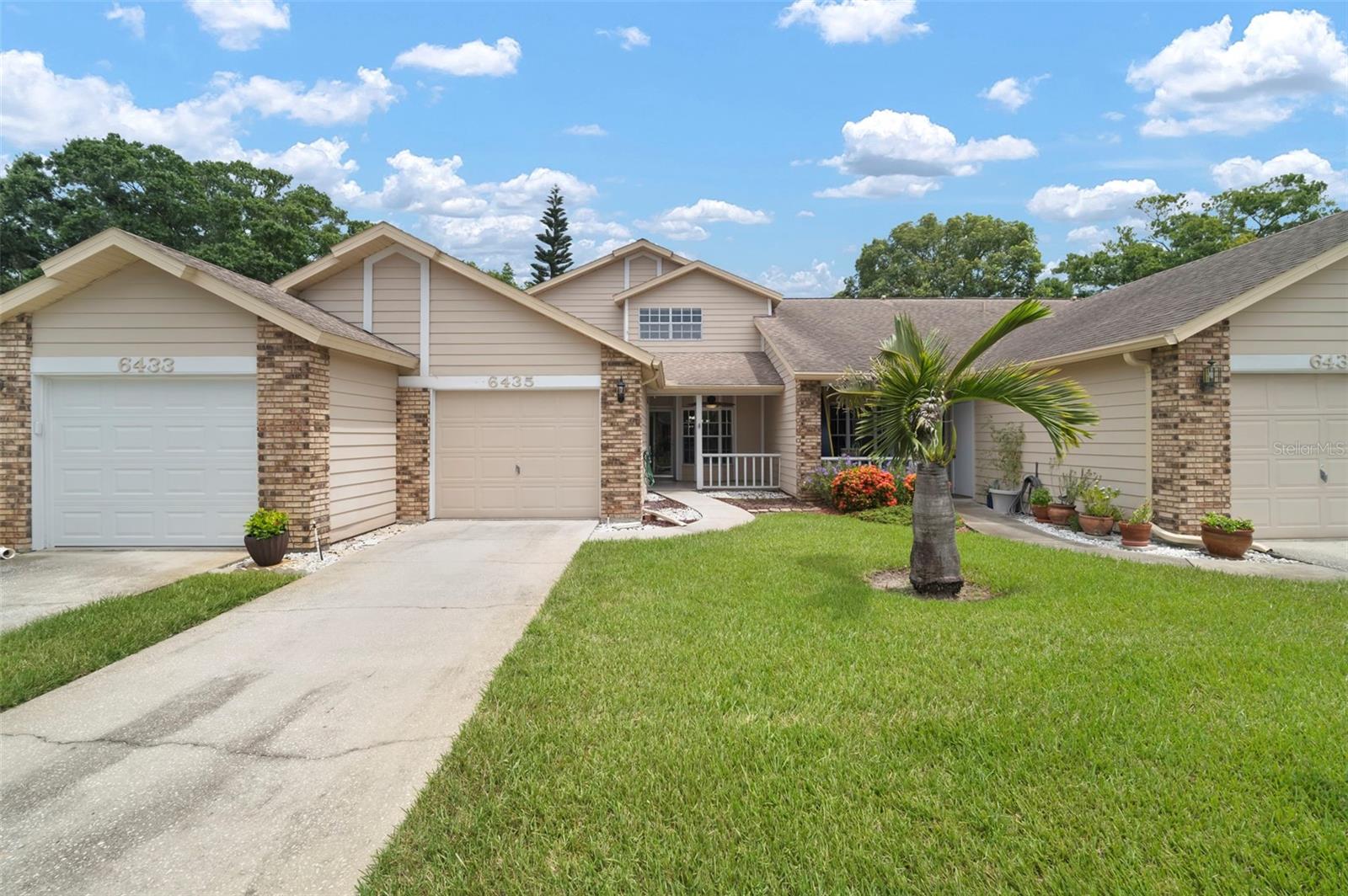 Welcome to your next chapter in the sought-after 55+ community of Briar Patch in New Port Richey!
This beautifully updated 2-story townhouse-style villa offers nearly 1,400 square feet of living space (over 1,800 total SF) with 3 spacious bedrooms, 2 full bathrooms, and an attached garage. Thoughtfully designed with an open-concept layout, the home features both a charming front porch and a private backyard—perfect for enjoying Florida’s sunshine.
Inside, you'll find a host of recent upgrades completed within the last few years, including a brand-new A/C system, a reimagined kitchen with stylish granite countertops, an expanded bar and island workspace, and a modern salt-free water filtration system.
The versatile main level offers the option to create a first-floor primary bedroom, ideal for added comfort and accessibility. A highlight of the home is the custom-installed motorized stair lift, offering effortless access to the second floor and making this residence a smart choice for those planning to age in place with ease and confidence.
Briar Patch is a pet-friendly (cats only) community with low HOA fees of just $215/month, covering exterior maintenance, roof replacement, and trash service. Residents enjoy a gated entrance, a sparkling community pool, and a beautifully maintained environment.
Homes like this don’t come along often—schedule your private showing today and experience the value and lifestyle that make this community so special!