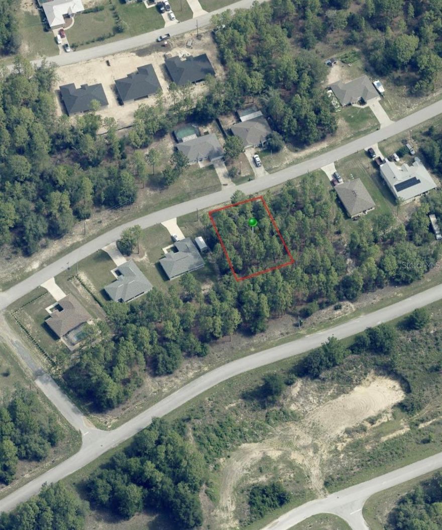 Affordable wooded high and dry buildable lot ion a paved street n a desirable area of Citrus Springs. Flood zone X.