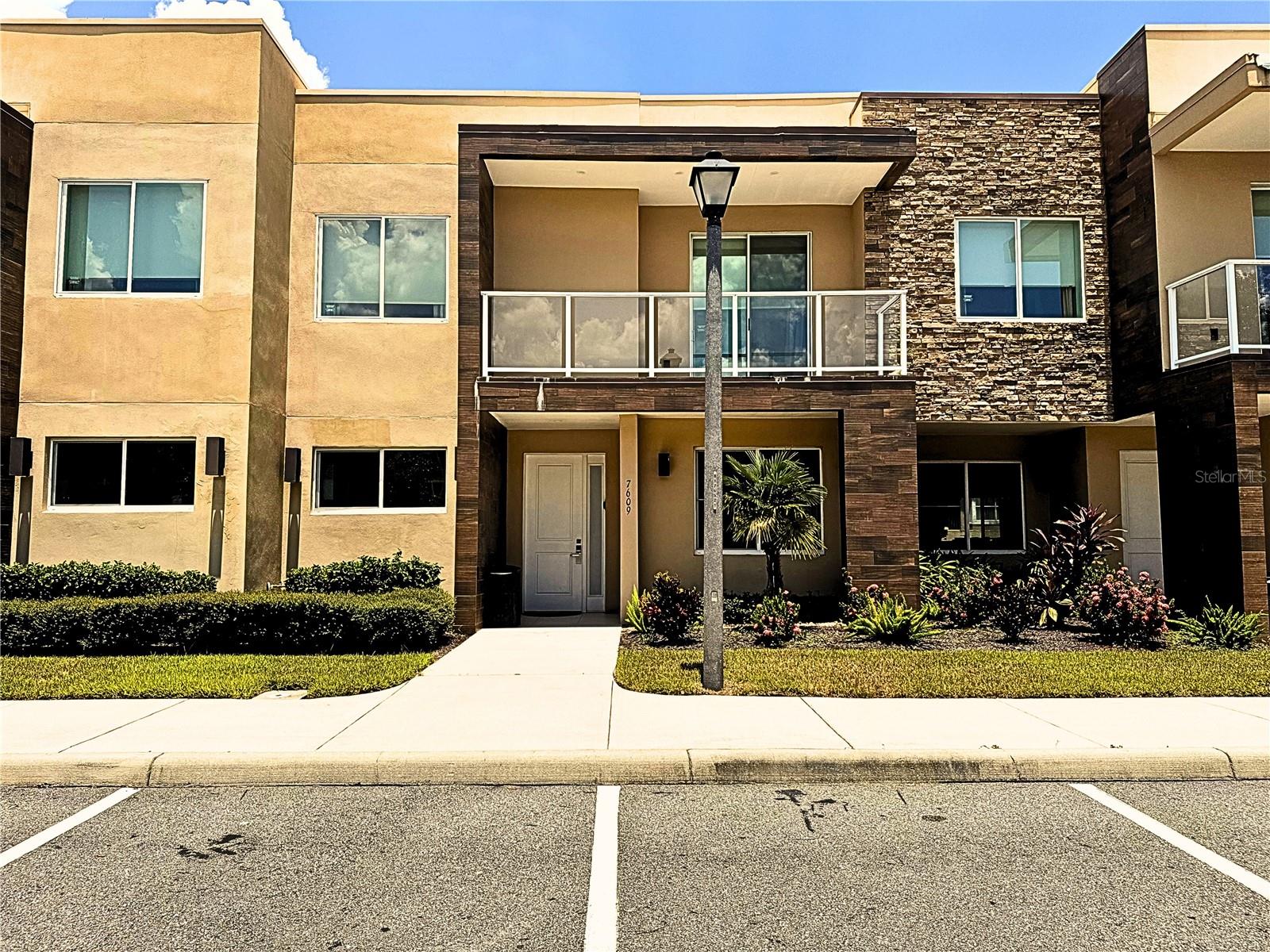 Experience luxury, comfort, and convenience in this stunning townhome at Magic Village Yards—just minutes from Magic Kingdom and Orlando’s world-famous attractions.
SELLER IS OPEN TO CONSIDERING A TRADE AS PART OF THE PAYMENT TOWARD PURCHASING A RESIDENTIAL PROPERTY OF HIGHER VALUE IN A PRIMARY MARKET OR LONG-TERM COMMUNITY.
This 4-bedroom, 4.5-bath home features two master suites, a soaring two-story living room, and a professionally designed interior with high-end furnishings throughout. Sold fully turnkey, the home includes flat-screen TVs, a fully equipped kitchen, and a full-size washer and dryer.
The main living space opens to an outdoor summer kitchen area with sink and grill, perfect for entertaining. The second-floor master suite features a private balcony, adding an elegant touch and additional space to relax.
As part of the Magic Village Yards community, owners and guests enjoy resort-style amenities including a 24-hour clubhouse, concierge services, fitness center, on-site restaurant, and available housekeeping services.
Ideal as a vacation home or income-producing short-term rental, this property offers exceptional potential in one of Orlando’s most desirable resort communities.
Schedule your private showing today and explore this rare combination of luxury living and flexible purchase options!
