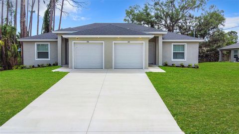 Photo of 2110 Dorion Street, Port Charlotte, FL 33948 (MLS # OM709104)