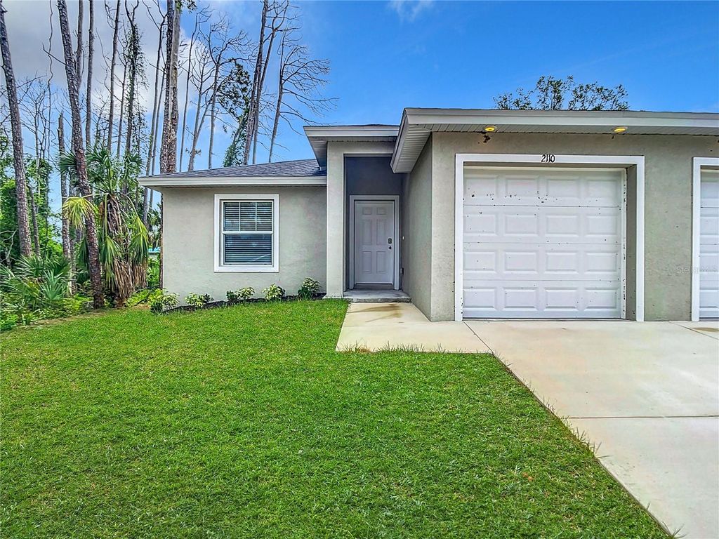 Photo of 2110 Dorion Street, Port Charlotte, FL 33948 (MLS # OM709104)