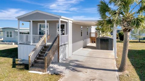 Photo of 105 W Saint Johns Way, Apollo Beach, FL 33572 (MLS # TB8461000)