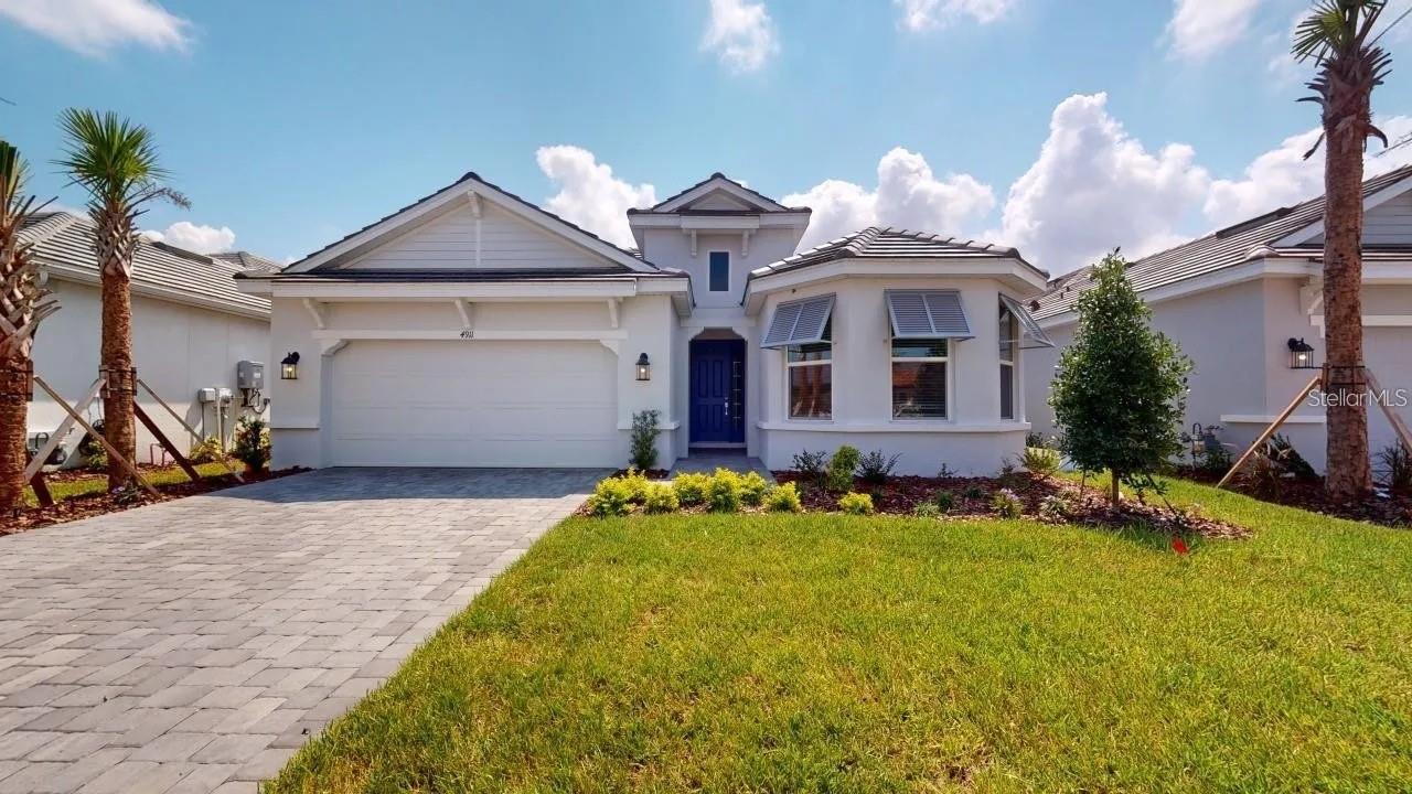 Welcome to 4911 Caserta Court, a beautifully upgraded home located in the serene, gated community of Esplanade at Artisan Lakes in Palmetto, Florida. This meticulously maintained residence offers a perfect blend of comfort, style, and privacy, making it an ideal retreat for those seeking quality living in a peaceful setting.
Featuring a spacious open-concept layout, this home is thoughtfully designed with elegant finishes and numerous upgrades throughout. The gourmet kitchen boasts high-end cabinetry, stainless steel appliances, granite countertops, and a large island that seamlessly connects to the dining and living areas—perfect for both everyday living and entertaining.
One of the standout features of this property is the extended screened-in patio that provides ample space for relaxing or hosting guests while enjoying the Florida lifestyle. With no backyard neighbors, you’ll enjoy added privacy and tranquil views year-round.
Additional highlights include custom lighting, upgraded flooring, a generously sized primary suite with a luxurious en-suite bath, and well-appointed secondary bedrooms. The home also includes a laundry room, ample storage, and a two-car garage.
Located just minutes from I-75, this home offers convenient access to Sarasota, St. Petersburg, and Tampa, while the community itself provides resort-style amenities including a pool, fitness center, clubhouse, and more.
4911 Caserta Court is truly move-in ready and offers an exceptional opportunity to own in one of Palmetto’s most desirable communities. Schedule your private showing today.