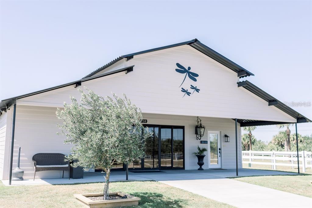 Operating event venue with brand recognition and confirmed bookings into 2027. The centerpiece is a 5,000+ SF barn converted from an 11-stall stable into an elegant event facility featuring Bride & Groom suites, office, pavilion, terrace, catering/staging areas, restrooms, and storage. Sale includes all inventory including the champagne truck! Approx. 4± acres are improved with an additional 4.5± cleared acres ready for expansion - consider weekday events, community programming, vendor packages, or on-site lodging- the possibilities are truly endless!
Additional parcel available and ideally combined sale with adjacent 704 Osmosis (4BR/3BA, 2,793 SF pool home on 2.67± acres) for a total 11± acres. Great area for Airbnb income. Financials and booking summaries available with NDA.