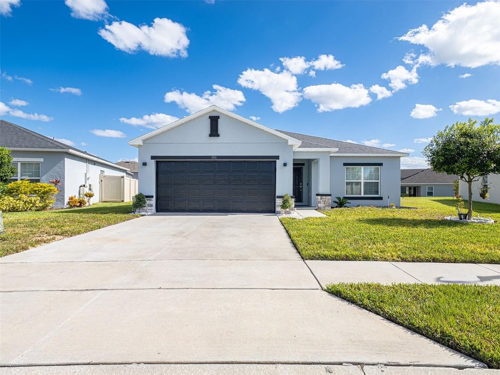 Photo of 596 Meadow Bend Drive, Davenport, FL 33837 (MLS # O6355708)