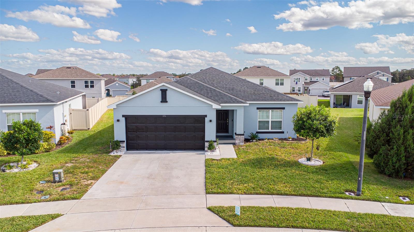 Welcome to Your Dream Home in the Heart of Davenport! Step into modern elegance with this beautiful 3-bedroom, 2-bathroom home, built by Taylor Morrison in 2020. Designed with both comfort and style in mind, this residence showcases a thoughtfully crafted interior that exudes warmth and sophistication. Recently freshly repainted inside and out, the home feels brand new — offering a bright, clean, and inviting atmosphere from the moment you walk through the door. The open-concept layout seamlessly connects the living, dining, and kitchen areas, creating the perfect setting for entertaining or unwinding after a long day. Every corner reflects pride of ownership and attention to detail, making this home truly move-in ready. Conveniently located just 12 minutes from I-4, you’ll enjoy effortless access to Orlando, Tampa, and Central Florida’s most popular attractions. Nearby Posner Park offers an array of shopping, dining, and entertainment options, while Champions Gate, just 10 minutes away, features world-class golf courses and resort-style amenities. Don’t miss this incredible opportunity to own a meticulously maintained Davenport gem. Schedule your private showing today and make this dream home yours!