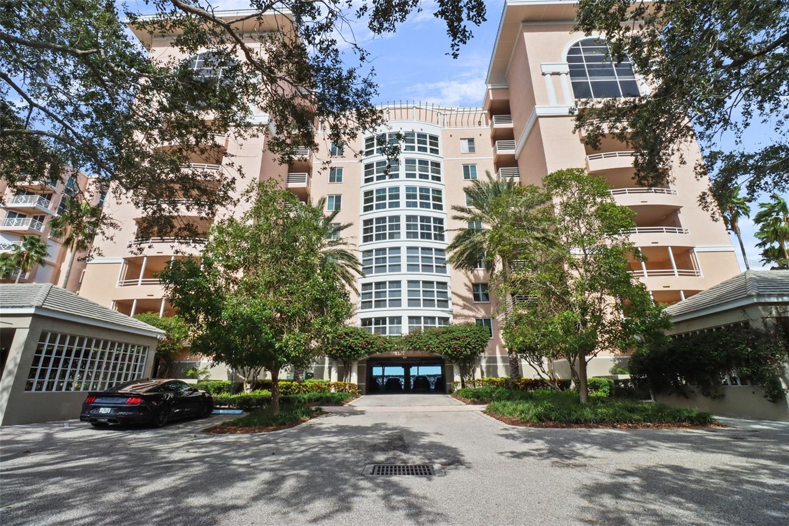 Welcome to your waterfront paradise- 3 bedroom 2 bath condominium where coastal comfort meets spacious living. The unit has 1,868 square feet of indoor living space. The open concept and bright layout seamlessly extends to 2 separate decks overlooking the breathtaking waters of Boca Ciega Bay and gorgeous landscaping. Picture dolphins & manatees playing in your backyard while watching mesmerizing sunsets. 2 reserved parking spaces in the first-level garage and the carport provide added convenience. Bacopa Bay is a highly sought-after mid-rise community that has recently passed Florida's required engineering milestone inspections and financial studies. The new owner will benefit from the many significant community updates completed in the last two years including brand new roofs and elevators, updated landscaping, seawall replacement, and repairs/replacements of sidewalks, curbs, and the community street. This 24/7 guard-gated community boasts resort-style amenities, including two heated pools (including a 25m lap pool), a jetted hot tub, a private beach, a walking path, a clubhouse with a fitness center, Har-tru lighted tennis courts, car wash stations, an EV charging station Lagoon with Waterfall, and immaculate lushly Landscaped grounds. Ideally located Close to Gulf Beaches, famed Ft Desoto Park, Minutes to all the Venues of Downtown St. Petersburg and 30 minutes to Tampa Int’l Airport. Experience the perfect blend of luxury, convenience and coastal living in this exceptional Bacopa Bay residence.