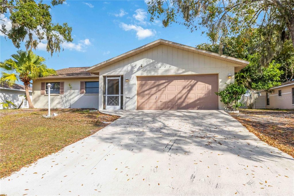 Photo of 8427 Brandeis Circle E, Sarasota, FL 34243 (MLS # TB8463107)
