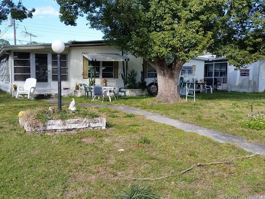 2 Bedroom, 1 Bath Doublewide with large Florida Room. Large Living Room, Dining Room Combination. Large Bedrooms. Located on quiet street 1 block long ending in a cul de sac. This house needs repairs and TLC to make this a good investment, rental property, first-time buyer potential. ;Water: City