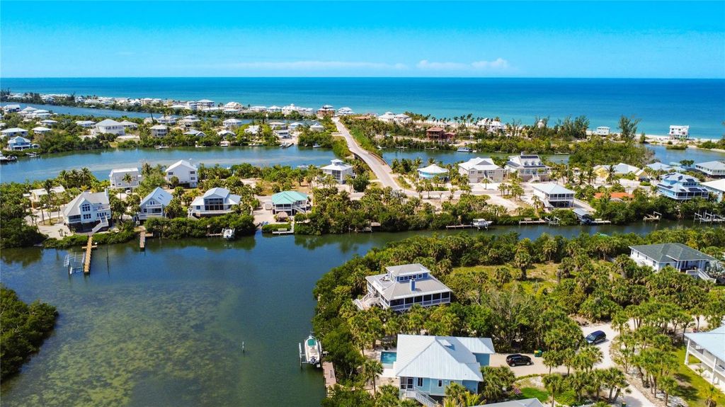 Photo of 39 Bayshore Circle, Placida, FL 33946 (MLS # TB8502162)