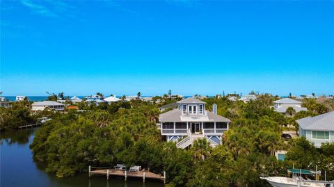 Photo of 39 Bayshore Circle, Placida, FL 33946 (MLS # TB8502162)