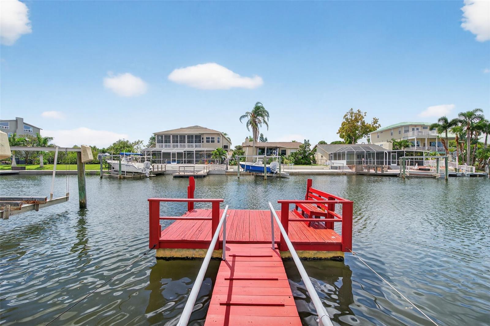 Boaters Paradise! Waterfront Living at Its Finest – Affordable, Stylish, and Move-In Ready!
Welcome to your dream home in the heart of Sea Pines – a vibrant Gulf Coast community where everyday living feels like a vacation! This stunning waterfront retreat offers the perfect blend of style, comfort, and Florida charm – all at a price that won’t break the bank.
Step inside and be wowed by the spacious open-concept design, featuring a large living room ideal for entertaining or simply relaxing with water views as your daily backdrop. The gorgeous kitchen is a true showstopper, with Quartz countertops, sleek cabinetry, and new luxury vinyl flooring that flows seamlessly throughout the home.
Enjoy peaceful mornings and serene evenings on your covered and screened patio, where you can sip your coffee or unwind with a glass of wine while watching the water gently ripple just beyond your backyard.
Nearly everything in this home is brand new including electrical box, kitchen, ac unit, windows and more giving you peace of mind and a fresh, modern aesthetic. Whether you're looking for a full-time residence, a seasonal escape, or an investment opportunity, this home delivers on every front.
Sea Pines offers more than just beautiful homes – it's a lifestyle. With a private community boat ramp, you're just moments away from exploring the open waters of the Gulf. Fishing, boating, and breathtaking sunsets await right outside your door.
Located in the charming coastal town of Hudson, you'll enjoy quick access to local shops, waterfront restaurants, major hospitals, and Tampa International Airport, all just a short drive away.
Don’t miss your chance to live the Florida waterfront lifestyle you’ve always dreamed of. Welcome home to Sea Pines – where every day feels like paradise. PS. Special Flood insurance policy already on the home for the next year so no extra flood insurance cost until October of 2026.
