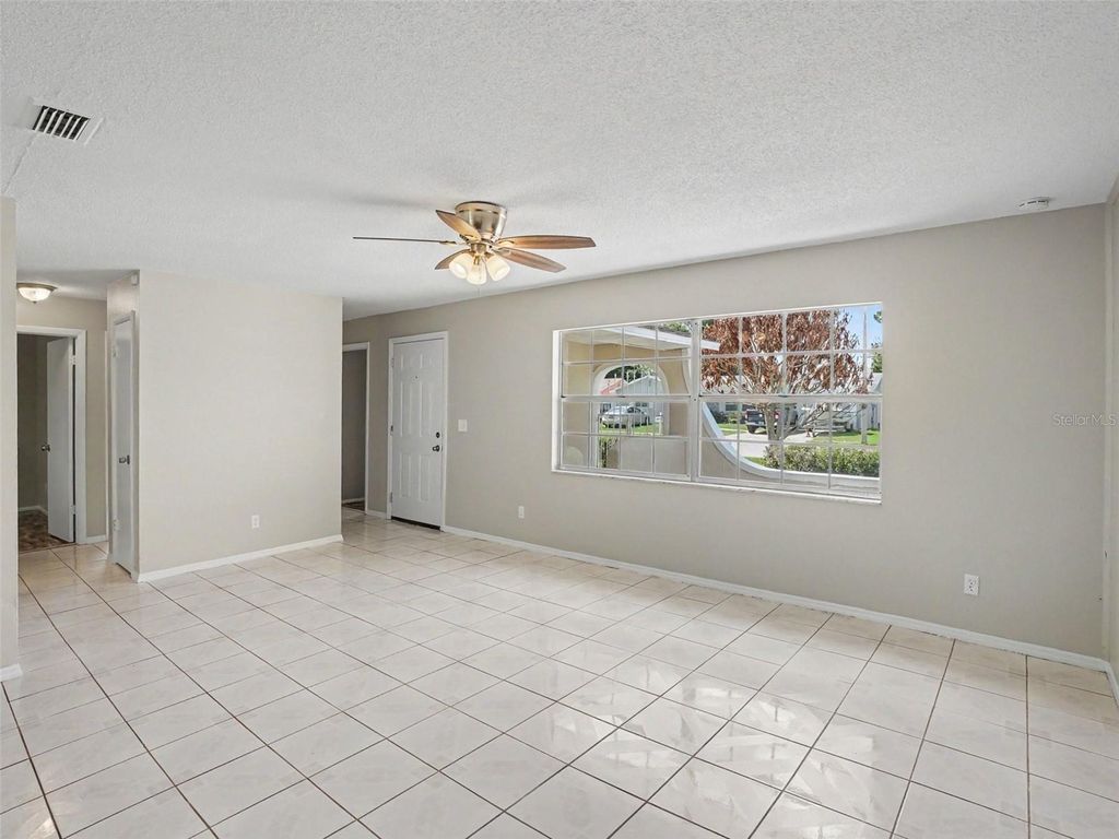 Photo of 615 Thomas Jefferson Way, Orlando, FL 32809 (MLS # O6408682)
