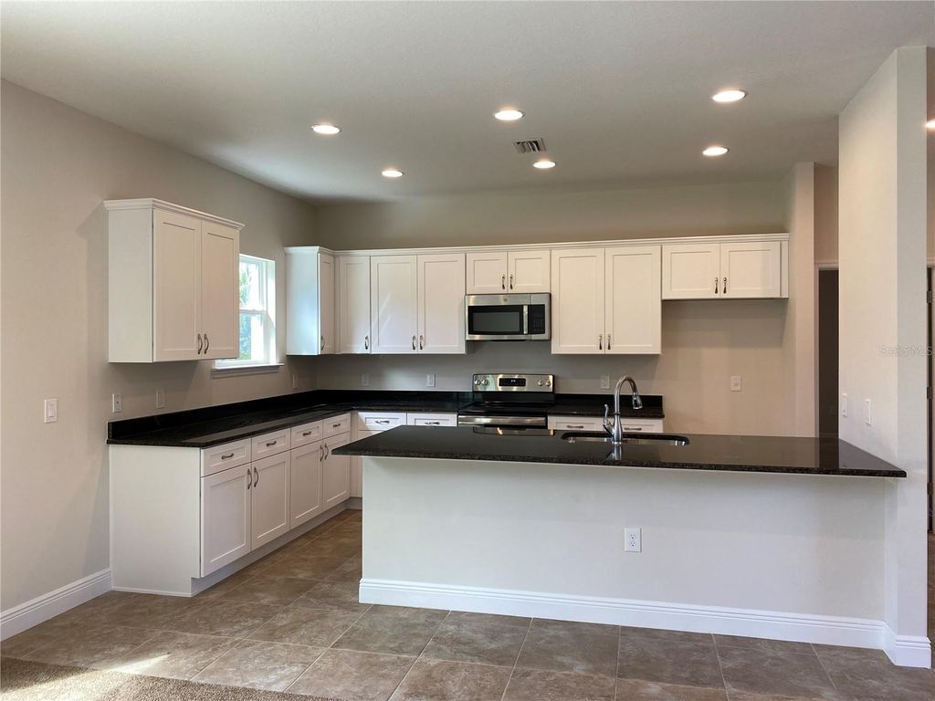 Photo of 1793 Namatka Avenue, North Port, FL 34288 (MLS # OM720569)