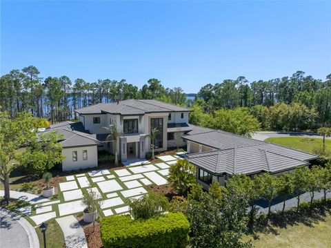 Photo of 8506 Lake Nona Shore Dr, Orlando, FL 32827 (MLS # O6392916)