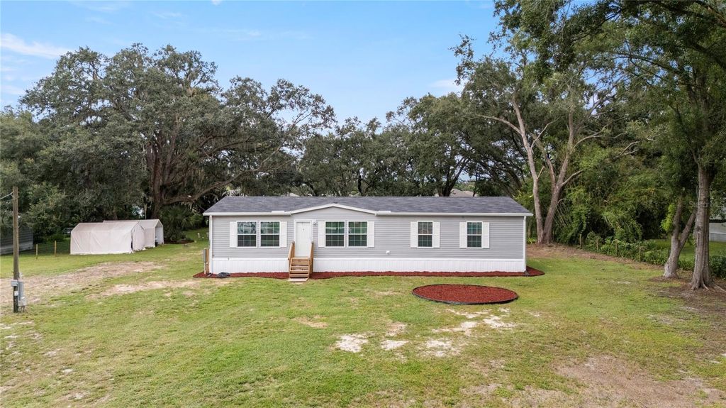 Photo of 34811 Appaloosa Trail, Zephyrhills, FL 33541 (MLS # TB8426999)