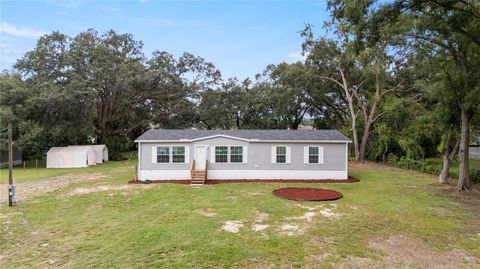 Photo of 34811 Appaloosa Trail, Zephyrhills, FL 33541 (MLS # TB8426999)