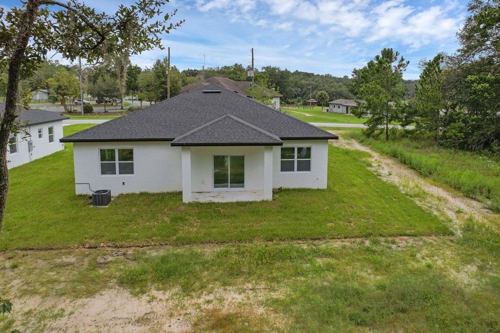 Photo of 205 Australian Drive, Rotonda West, FL 33947 (MLS # C7527121)