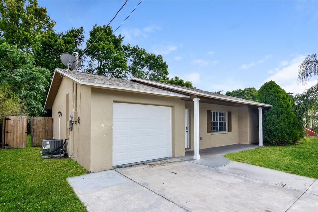 Photo of 7338 Coventry Drive, Port Richey, FL 34668 (MLS # TB8368352)