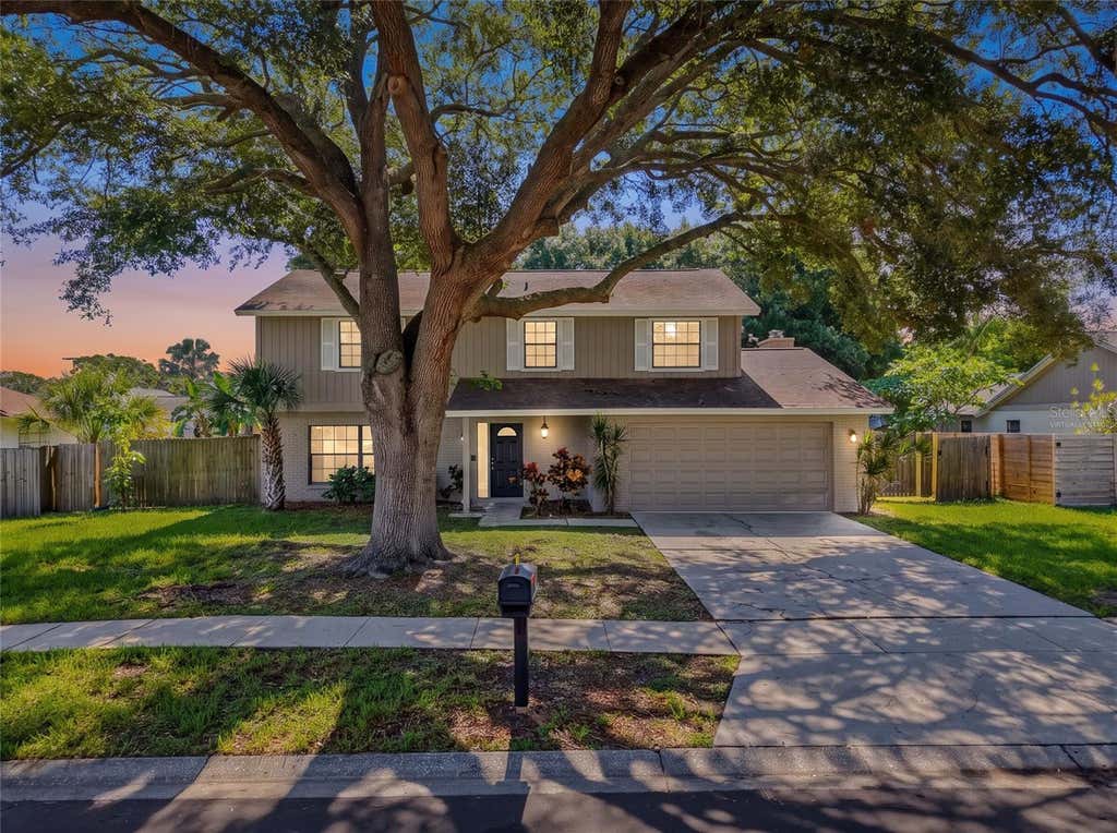 Photo of 414 Still Meadows Circle E, Palm Harbor, FL 34683 (MLS # W7888035)