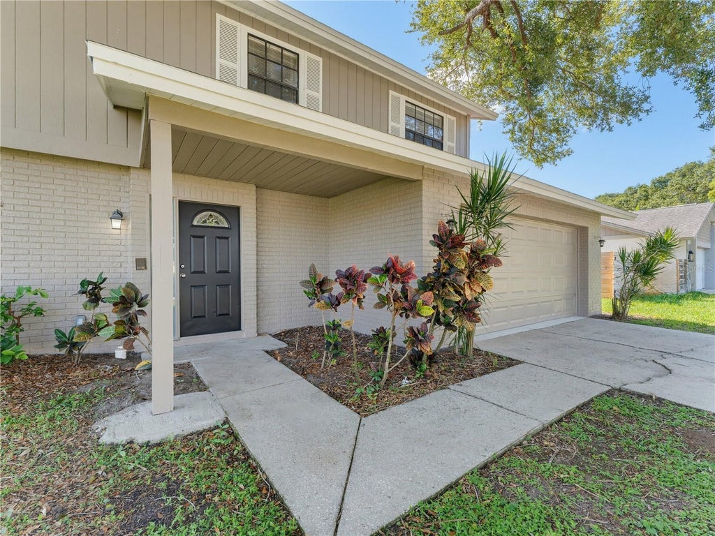 Photo of 414 Still Meadows Circle E, Palm Harbor, FL 34683 (MLS # W7888035)