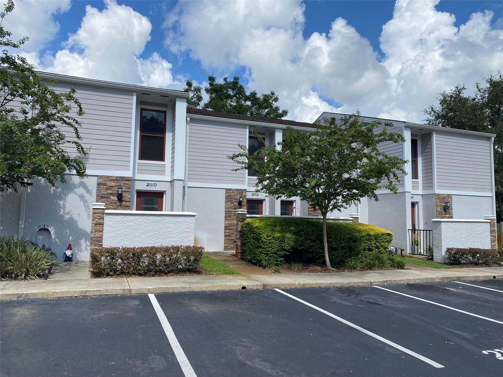 Great opportunity to own a 2 bedroom and 2 bath Townhome a great price! Add your own flooring and other interior touches to make it all yours! The downstairs consists of the kitchen, dining and living room, laundry area and a bathroom with shower with glass sliders from living room to downstairs private enclosed courtyard patio area. The upstairs offers two spacious bedrooms; one with a walk-in closet and glass sliders to private balcony. The other bedroom has two separate closets. A shared bathroom tub/shower although, offer separate vanities. This townhome comes with one designated parking spot and there are other available additional parking spaces. There is no yard work to worry about and low HOA fees. This quaint community is centrally located minutes to so many conveniences in Ocala.