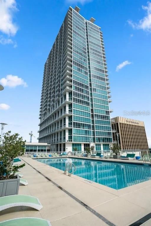 Fully Furnished Luxury High-Rise with Unmatched Lake & City Views – 4BD/3BA at VUE at Lake Eola (29th Floor)
Discover elevated living in the heart of Downtown Orlando with this exquisite 4-bedroom, 3-bath residence perched on the 29th floor of the iconic VUE at Lake Eola. Set within one of the city’s most prestigious high-rises, this fully furnished home blends elegance, comfort, and sophistication in every detail.
Step inside to an expansive, light-filled living space designed for both relaxation and entertaining. The open-concept layout seamlessly connects the living room, dining area, and gourmet kitchen while floor-to-ceiling glass walls showcase sweeping panoramic views of Lake Eola and the Orlando skyline.
The chef’s kitchen is equipped with premium appliances, sleek countertops, and ample storage, ready for everything from casual dining to culinary creations. Each bedroom is generously sized, filled with natural light, and thoughtfully furnished for comfort and style. The three spa-inspired bathrooms feature high-end finishes and modern design.
The oversized private balcony is the crown jewel your outdoor sanctuary with unmatched views of the lake and city lights, ideal for morning coffee or evening cocktails.
At VUE at Lake Eola, luxury extends far beyond your residence. Residents enjoy world-class amenities including a resort-style pool, state-of-the-art fitness center, tennis courts, 24-hour security, concierge services, and secured underground parking.
This is more than a home it’s a lifestyle. Don’t miss this rare opportunity to experience one of Orlando’s most sought-after addresses. Schedule your private tour today and make VUE at Lake Eola your next home.