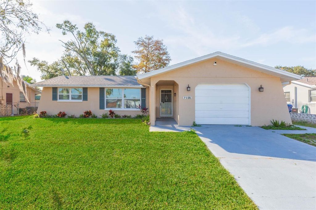 Photo of 7336 Cherry Laurel Drive, Port Richey, FL 34668 (MLS # TB8473485)