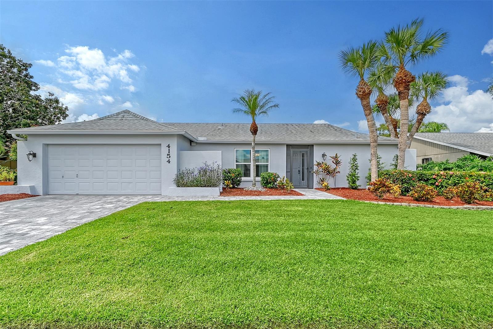 True 4 bedroom 3 bath pool home in popular Gulf Gat East. New roof only 5 yrs. old. All impact windows. Large re-finished pool, new pool pump with paver brick patio. Generous back yard which can be fenced. Very low association fee of $270 per yr. Updated kitchen with RO system & updated bathrooms. Recently painted exterior. Updated 5 zone irrigation system. New AC in 2022. New ceiling fans throughout (2020). The entire home is tiled. This is an excellent value for Gulf Gat East which is centrally located near shopping, restaurants & short distance to world famous Siesta Key Beach.