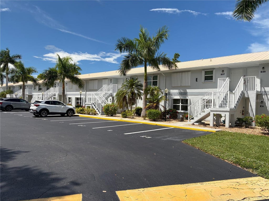 Photo of 26485 Rampart Boulevard #E24, Punta Gorda, FL 33983 (MLS # C7531260)