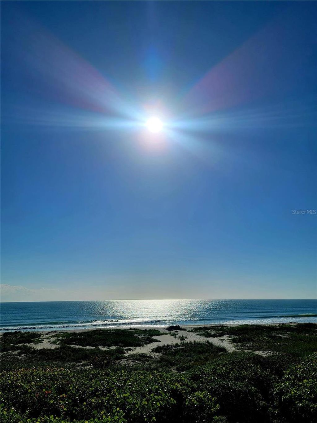 Photo of 750 N Atlantic Avenue #1104, Cocoa Beach, FL 32931 (MLS # O6405305)