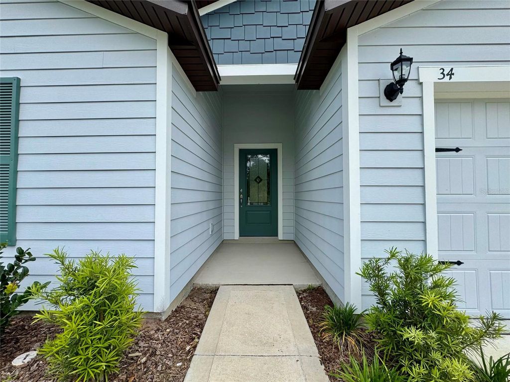 Photo of 34 Presidential Lane, Palm Coast, FL 32164 (MLS # NS1087996)