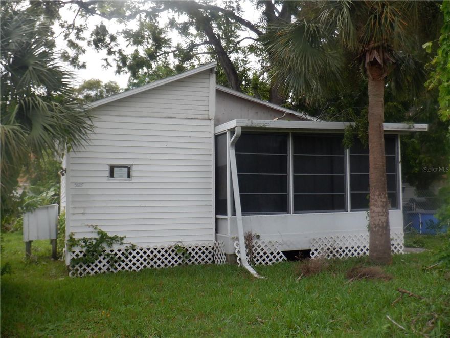 2/1 rough Frame Home. Built in 1951. Vaulted Ceilings. Dog kennel. Home has been gutted. Needs a kitchen, bathroom, flooring and more. Has a nice enclosed screened front porch. Back porch needs replacing. Home flooded during Hurricane Helene.