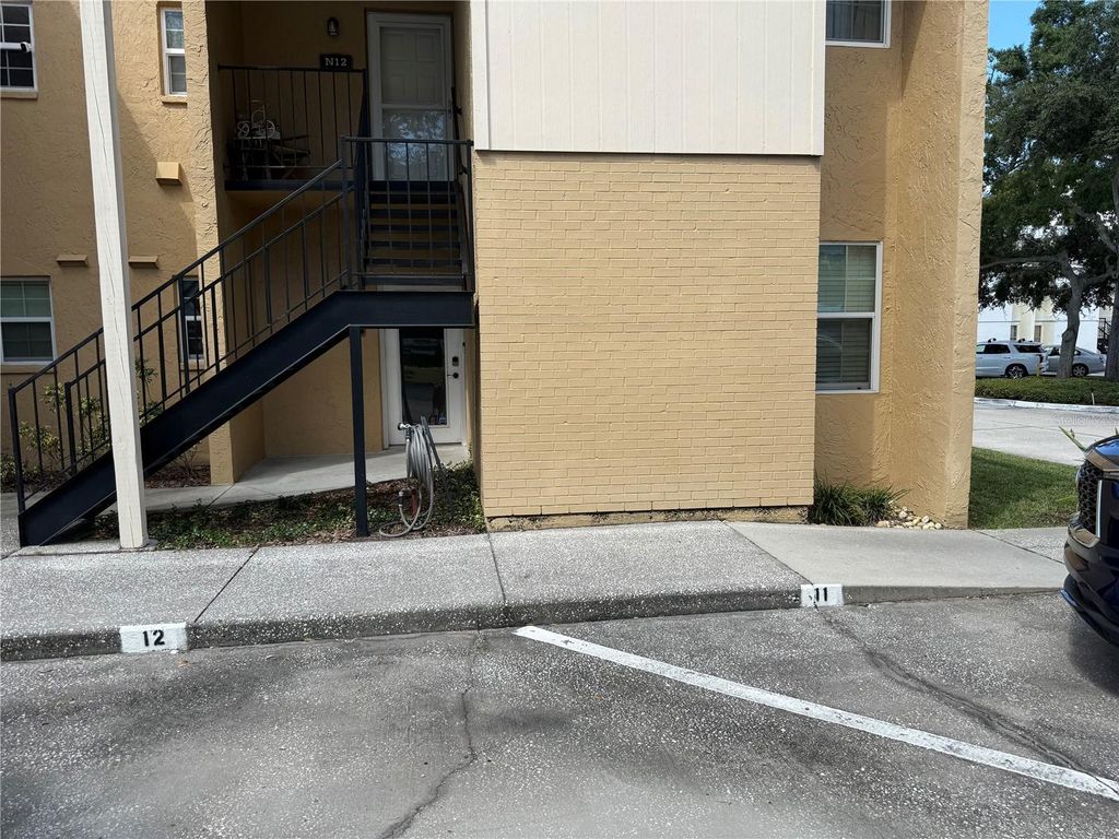 Photo of 3810 N Oak Drive #N11, Tampa, FL 33611 (MLS # TB8431295)